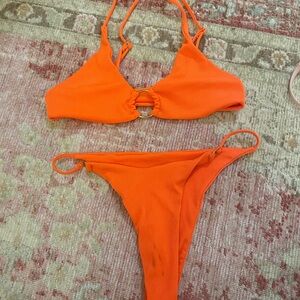 Orange two piece bikini.